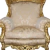 Casa Padrino Barock Sessel Al Capone Creme / Gold - Massivholz - 127 x 90 x 80 cm