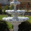 Casa Padrino Barock Springbrunnen mit dekorativer Lilie Grau Ø 129 x H. 196 cm - Prunkvoller Gartenbrunnen im Barockstil - Runder Gartendeko Stein Brunnen - Barock Garten Deko Accessoires