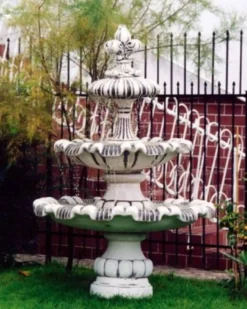 Casa Padrino Barock Springbrunnen mit dekorativer Lilie Weiß / Braun Ø 129 x H. 175 cm - Prunkvoller Gartenbrunnen im Barockstil - Runder Gartendeko Stein Brunnen - Barock Garten Deko Accessoires