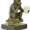 Casa Padrino Designer Bronzefigur mit Marmorsockel Studierter Affe Bronze / Mehrfarbig / Schwarz 8,1 x 12,3 x H. 14,3 cm - Schreibtisch Deko - Deko Accessoires