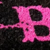 Casa Padrino Designer Fußmatte Bitch mit Schriftzug, schwarz-pink, Länge 70 cm, Breite 40 cm, Höhe 2 cm