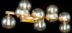 Casa Padrino Designer Wandleuchte Gold / Bernsteinfarben 66 x 23 x H. 24 cm - Moderne Wohnzimmer Lampe