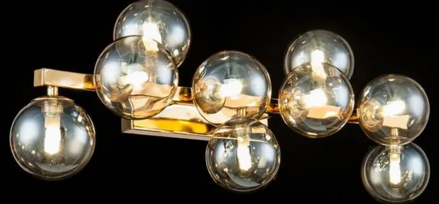 Casa Padrino Designer Wandleuchte Gold / Bernsteinfarben 66 x 23 x H. 24 cm - Moderne Wohnzimmer Lampe