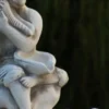 Casa Padrino Jugendstil Gartenbrunnen Junge mit Muscheln Grau 43 x 37 x H. 118 cm - Eleganter Gartendeko Stein Brunnen - Barock & Jugendstil Garten Deko Accessoires