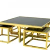 Casa Padrino Luxus Art Deco Designer Couchtisch 5er Set Gold mit schwarzem Glas 100 x 100 x H. 40 cm / 48 x 48 x H. 33 cm