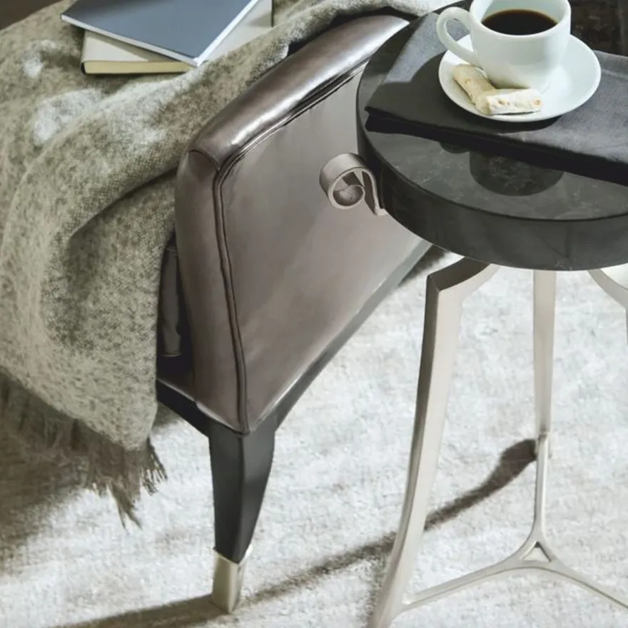 Casa Padrino Luxus Art Deco Leder Ohrensessel Braun / Schwarz / Silber H. 102 cm