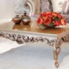 Casa Padrino Luxus Barock Couchtisch Beige / Kupferfarben 133 x 92 x H. 45 cm - Prunkvoller Massivholz Wohnzimmertisch mit edlen Verzierungen - Barock Wohnzimmer Möbel