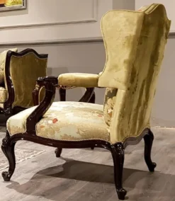 Casa Padrino Luxus Barock Ohrensessel Gold / Mehrfarbig / Schwarz - Prunkvoller Wohnzimmer Sessel mit elegantem Muster - Barock Möbel