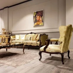 Casa Padrino Luxus Barock Ohrensessel Gold / Mehrfarbig / Schwarz - Prunkvoller Wohnzimmer Sessel mit elegantem Muster - Barock Möbel