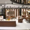 Casa Padrino Luxus Beistelltisch Braun / Grau / Gold - Verspiegelter 8 eckiger Massivholz Tisch - Wohnzimmer Möbel - Wohnzimmer Einrichtung - Luxus Möbel - Luxus Einrichtung - Luxus Qualität