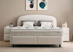 Casa Padrino Luxus Boxspringbett mit geschwungenem Kopfteil Creme 160 x 200 cm - Luxus Schlafzimmer Möbel