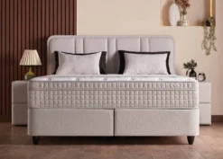 Casa Padrino Luxus Boxspringbett mit gerahmtem Kopfteil Creme 140 x 200 cm - Luxus Schlafzimmer Möbel
