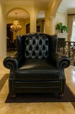 Casa Padrino Luxus Chesterfield Leder Ohrensessel Schwarz / Dunkelbraun - Chesterfield Echtleder Wohnzimmer Sessel - Wohnzimmer Möbel - Chesterfield Möbel - Echtleder Möbel - Luxus Möbel