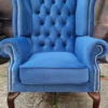 Casa Padrino Luxus Chesterfield Ohrensessel Blau / Dunkelbraun 98 x 90 x H. 110 cm - Chesterfield Samt Sessel - Wohnzimmer Möbel - Chesterfield Möbel - Luxus Möbel