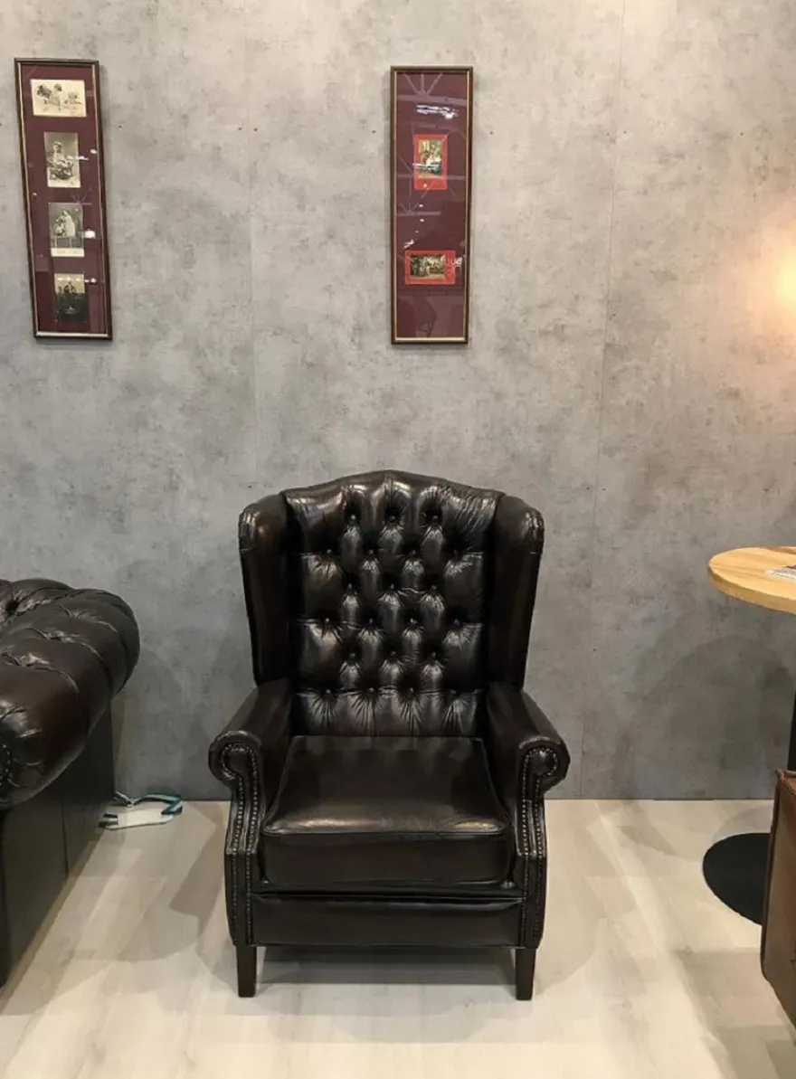 Casa Padrino Luxus Chesterfield Leder Ohrensessel Schwarz - Chesterfield Echtleder Wohnzimmer Sessel - Wohnzimmer Möbel - Chesterfield Möbel - Echtleder Möbel - Luxus Möbel - Luxus Einrichtung