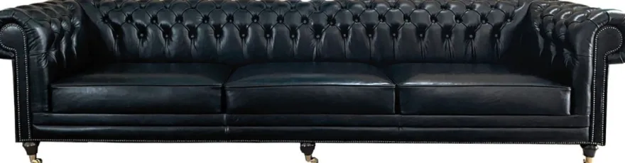 Casa Padrino Luxus Chesterfield Leder Sofa Vintage Schwarz - Echtleder Wohnzimmer Sofa mit Rollen - Luxus Chesterfield Möbel
