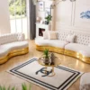 Casa Padrino Luxus Chesterfield 3er Sofa Creme / Gold 230 x 105 x H. 82 cm - Gebogenes Chesterfield Wohnzimmer Sofa - Wohnzimmer Möbel - Chesterfield Möbel - Luxus Möbel - Luxus Einrichtung