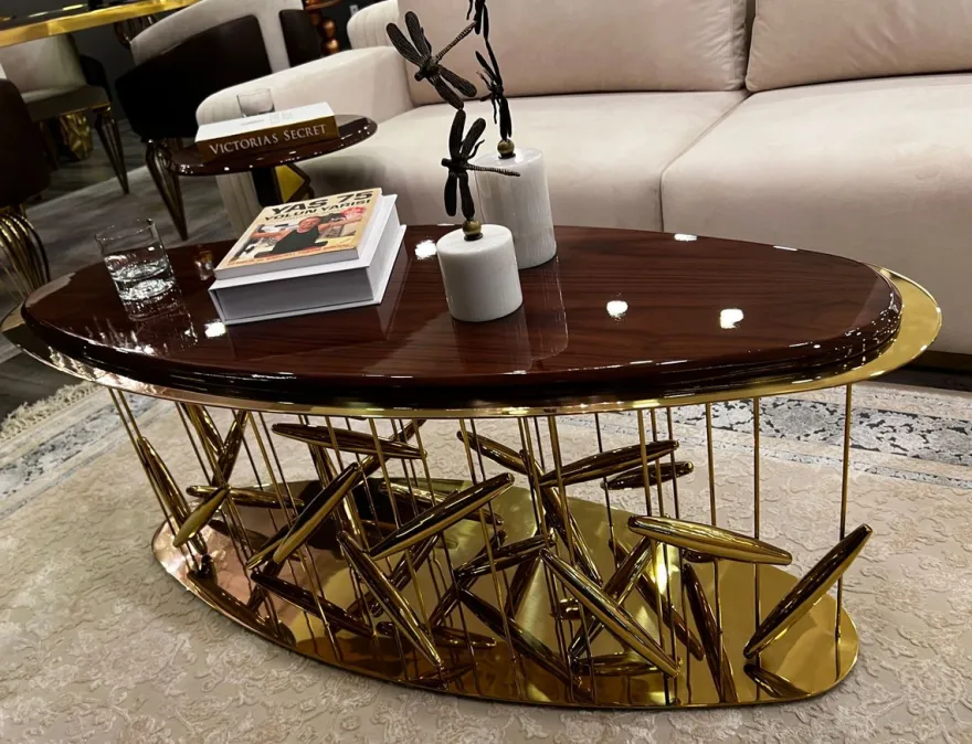 Casa Padrino Luxus Couchtisch Braun / Gold 120 x 51 x H. 47 cm - Ovaler Edelstahl Wohnzimmertisch mit Massivholz Tischplatte - Wohnzimmer Möbel - Hotel Möbel - Luxus Möbel