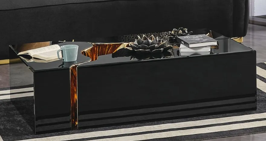 Casa Padrino Luxus Couchtisch Schwarz / Gold 110 x 70 x H. 43 cm - Rechteckiger Wohnzimmertisch - Wohnzimmer Möbel - Luxus Möbel - Luxus Einrichtung - Wohnzimmer Einrichtung
