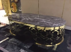 Casa Padrino Luxus Couchtisch mit Kunstmarmor Tischplatte Grau-Schwarz / Gold 140 cm