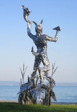 Casa Padrino Luxus Deko Skulptur Pan Silber 125 x 126 x H. 295 cm - Riesige Edelstahl Skulptur - Riesige Garten Deko Figur - Garten Skulpturen - Metall Skulpturen
