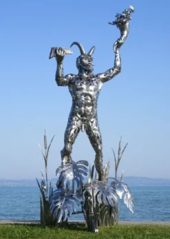 Casa Padrino Luxus Deko Skulptur Pan Silber 125 x 126 x H. 295 cm - Riesige Edelstahl Skulptur - Riesige Garten Deko Figur - Garten Skulpturen - Metall Skulpturen