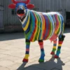 Casa Padrino Luxus Deko Skulptur Kuh Multicolored Striped Cow H. 150 cm - Riesige Gartenskulptur - Lebensgroße Skulptur - XXL Deko Skulptur - XXL Deko Figur