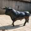 Casa Padrino Luxus Deko Skulptur Kuh Bull Trash Gold H. 150 cm - Riesige Gartenskulptur - Lebensgroße Skulptur - XXL Deko Skulptur - XXL Deko Figur