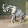 Casa Padrino Luxus Deko Skulptur Elefant Realistisch H. 44 cm - Deko Skulptur - Deko Figur - Tierfigur - Gartendeko