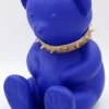 Casa Padrino Luxus Designer Dekofigur Teddybär mit Halsband Blau / Gold H. 31 cm - Kunstharz Deko Skulptur - Luxus Deko Figur - Designer Deko Figur - Luxus Accessoires