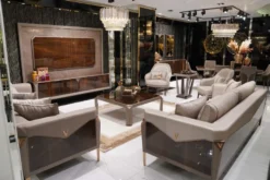 Casa Padrino Luxus Designer Sessel Grau / Dunkelbraun / Gold - Wohnzimmer Sessel - Hotel Sessel - Wohnzimmer Möbel - Luxus Möbel - Wohnzimmer Einrichtung - Luxus Einrichtung - Möbel Luxus