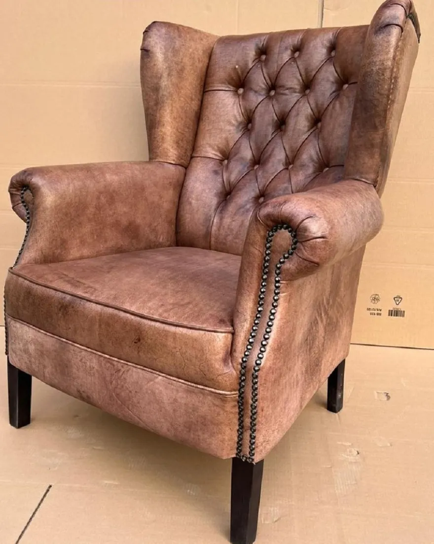 Casa Padrino Luxus Echtleder Chesterfield Ohrensessel Vintage Braun / Schwarz Wohnzimmer Sessel Leder