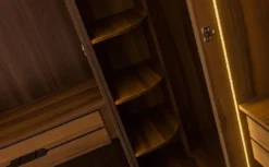 Casa Padrino Luxus Eck Kleiderschrank Braun / Schwarz 345 x 345 x H. 220 cm - Massivholz Schlafzimmerschrank mit 11 Glastüren und LED Beleuchtung - Schlafzimmer Möbel - Hotel Möbel - Luxus Möbel