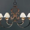 Casa Padrino Luxus Kronleuchter Rostbraun B. 120 x H. 80 cm - Handgefertigter Kronleuchter aus Schmiedeeisen - Luxus Kollektion - Edel & Prunkvoll