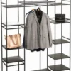 Casa Padrino Luxus Metall Regalschrank Schwarz / Messingfarben 150 x 40 x H. 200 cm - Wohnzimmerschrank - Bücherschrank - Metall Möbel
