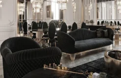 Casa Padrino Luxus Sessel Schwarz / Gold 120 x 88 x H. 88 cm - Moderner Wohnzimmer Sessel - Wohnzimmer & Hotel Möbel - Luxus Kollektion