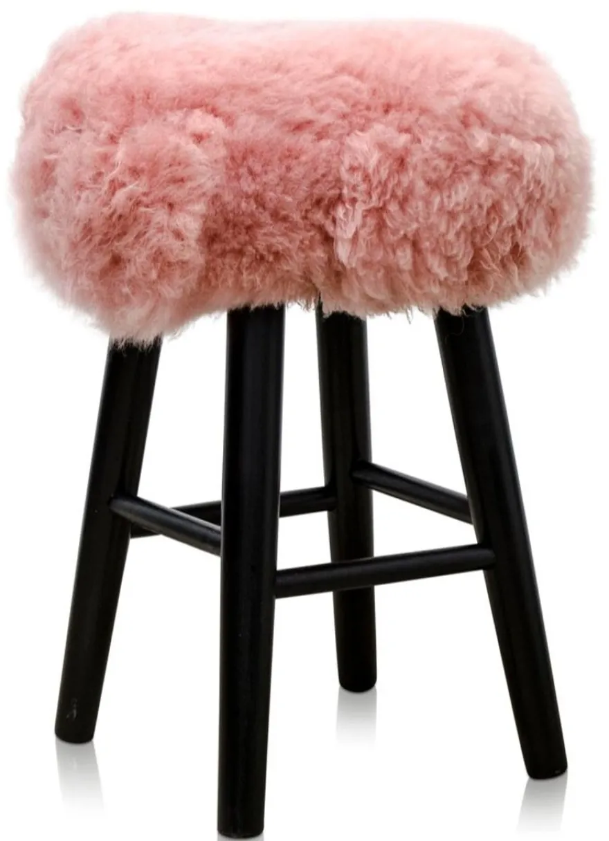 Casa Padrino Luxus Sitzhocker in Rosa und Schwarz, Ø 40 x H. 57 cm, Hocker aus Kiefernholz mit weichem Schafsfell