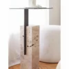 Casa Padrino Luxus Travertin Beistelltisch mit Metall Tischplatte Beige / Schwarz H. 70 cm