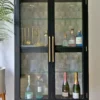 Casa Padrino Luxus Vitrine mit LED Beleuchtung Schwarz / Gold 124 x 57 x H. 177 cm - Beleuchteter Massivholz Vitrinenschrank mit 2 Glastüren - Wohnzimmer Möbel - Luxus Möbel