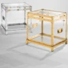Eichholtz Flightcase Exposed Gold - Beistelltisch aus Acryl mit Messingrahmen und Ständer