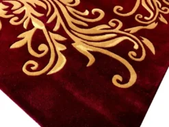 Pompöös by Casa Padrino Luxus Teppich von Harald Glööckler 80 x 150 cm Krone Bordeauxrot / Gold - Barock Design Teppich - Handgewebt aus Wolle